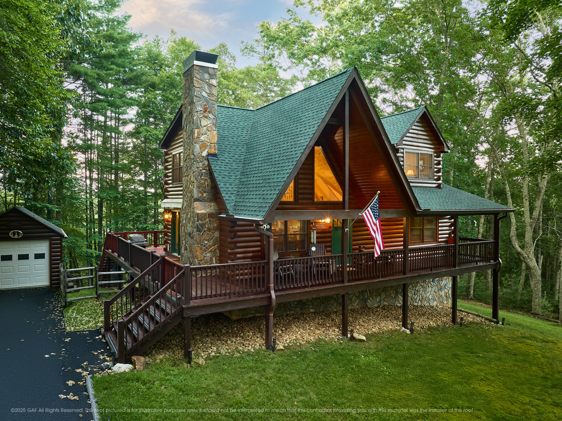 Hunter green roof on an A-frame cabin
