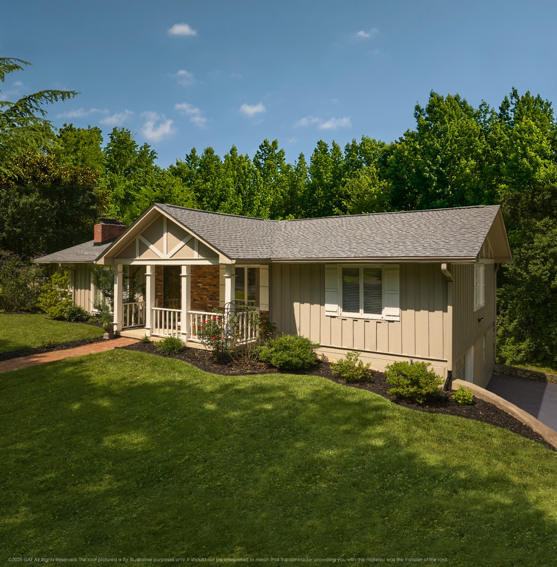 Newly installed gray shingle roof on a ranch-style home