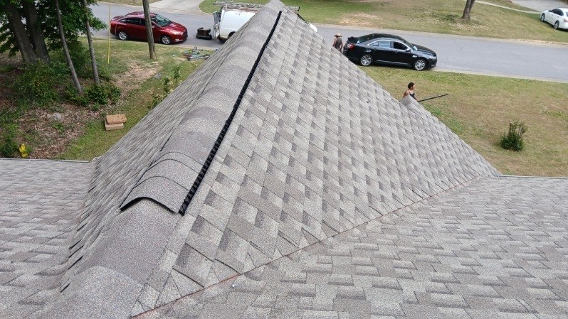 Same hip roof finished with flawless new architectural shingles