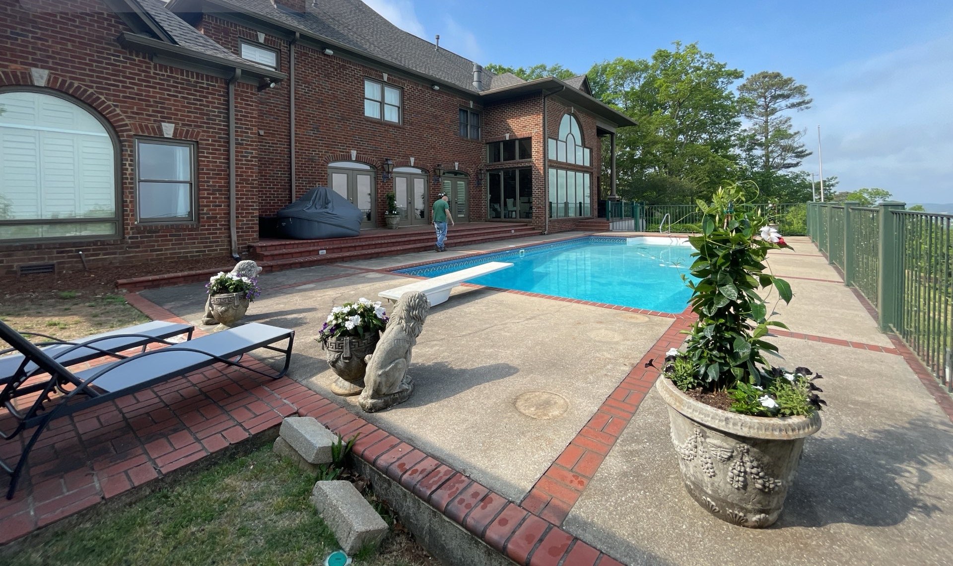 Same hilltop pool estate after a full roof system replacement