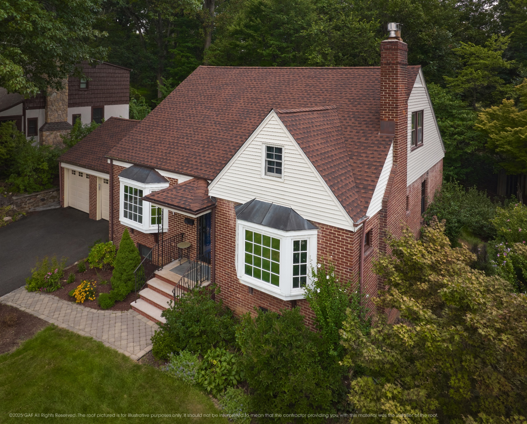 Hickory roof color on a brick home with gables